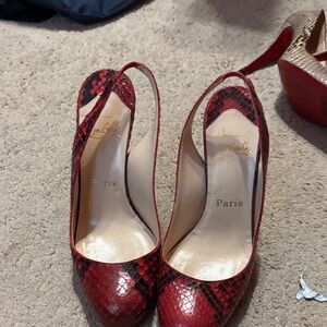 Christian Louboutin Red and Black Snake Print Heels